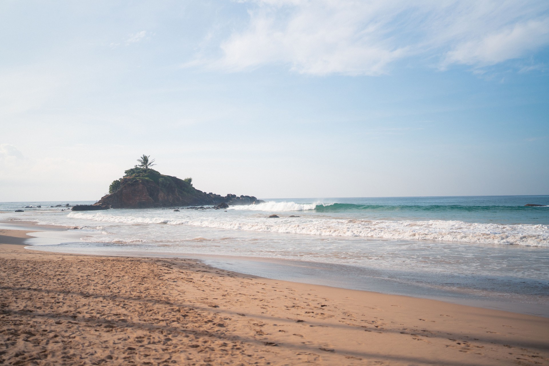 Mirissa beach with hill